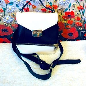 5/$25 Steve Madden tuxedo backpack bag